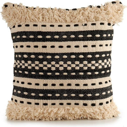 Decoratief beige gebreid kussen met katoenmotieven in beige en zwart. Afmetingen 45x15x45 cm