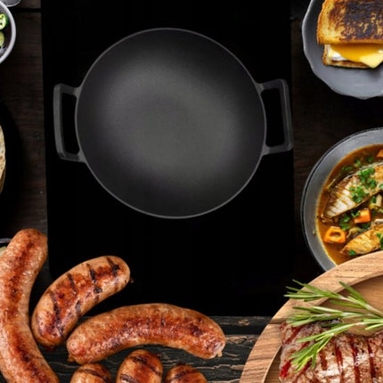 Hage - Gietijzeren Wok - Wokpan met 2 Handgrepen - Massief Gietijzer - Inductie - Gas - Elektrisch - Keramisch - Ovenbestendig - Geschikt voor Open Vuur - Warmtebehoud - Voor Aziatisch Roerbakken, Braden en Stir Fry - Ø36 cm - Zwart