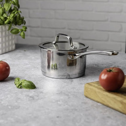 Steelpan 16 cm met glazen afgietdeksel en maataanduiding, rvs