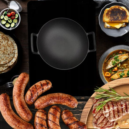 Hage - Gietijzeren Wok - Wokpan met 2 Handgrepen - Massief Gietijzer - Inductie - Gas - Elektrisch - Keramisch - Ovenbestendig - Geschikt voor Open Vuur - Warmtebehoud - Voor Aziatisch Roerbakken, Braden en Stir Fry - Ø36 cm - Zwart